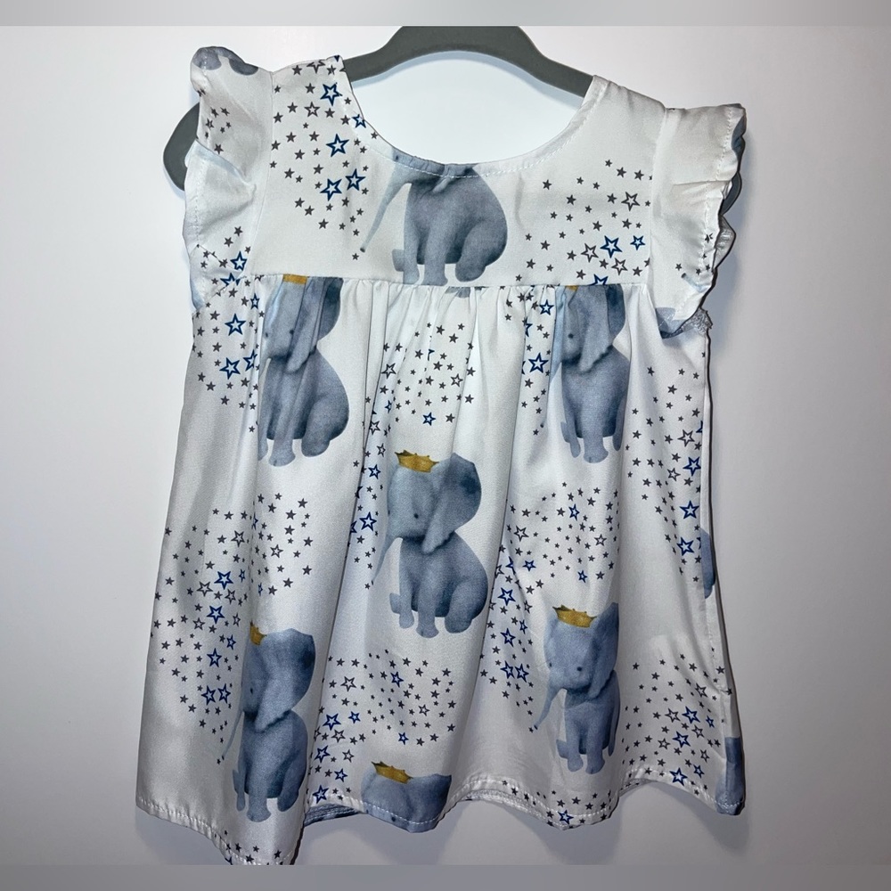 Shenzhen MBB Garment Ltd. Baby dress elephant with crown and stars design, 6-9M.